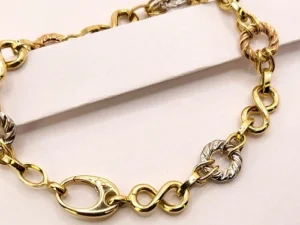 бутикова изискана мека  златна гривна от 14 к трицветно злато с акцент златни рингове възможна покупка на изплащане